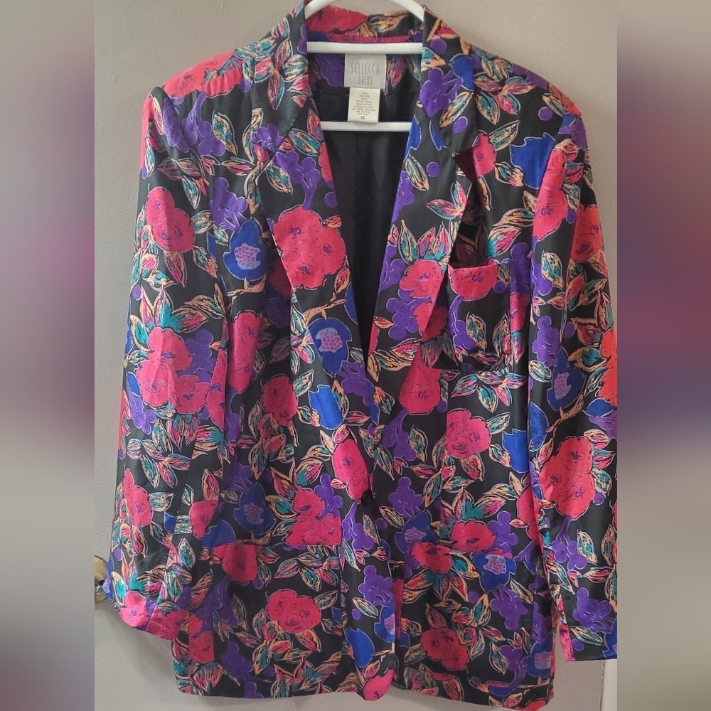 Floral Silk Blazer with Pink and Purple Hues. Front Pockets And Button Closure.